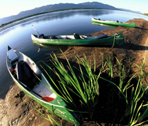 Canoes along the Zambezi River // © 2011 Chuck Graham